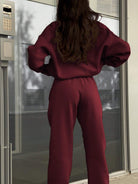 Langry fashion maroon jumpsuit with bell sleeves and elastic waistband ملابس