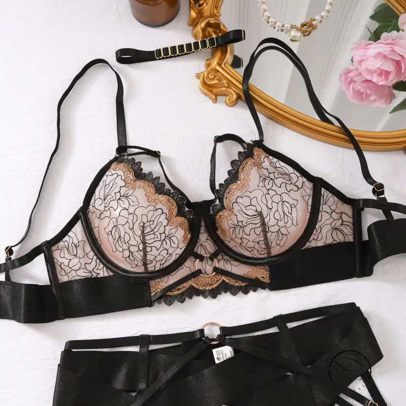 Pink floral lace langry bra with black trim, elegant fashion design