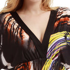 Elegant holiday beach dress with V-neck pattern showcasing stylish ملابس fashion