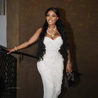 Elegant white beaded gown from Stunning Party Dress, perfect for fashion enthusiasts and special events