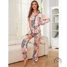 Women’s pink satin winter animal long sleeved pajama set with black leopard print