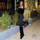 Elegant furry slim fit patchwork jumpsuit in black fur-trimmed fashion design