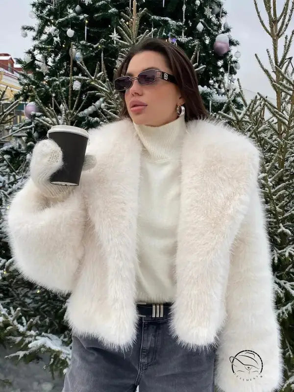 Gorgeous faux fur jacket with black belt and sunglasses
