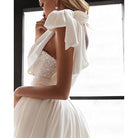 Elegant white wedding dress with sequined bodice, perfect for langry fashion lovers