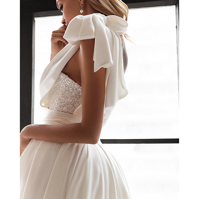 Elegant white wedding dress with sequined bodice, perfect for langry fashion lovers