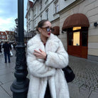 Warm winter faux fur coat with high collar and long sleeves