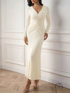Beautiful knitted cream ruched long-sleeved dress