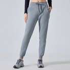 Gray drawstring jogger sweatpants for women, perfect for autumn winter fashion and fitness