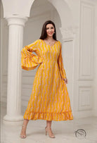 Vibrant yellow langry fashion midi dress with bell sleeves and paisley patterns