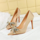 Langry fashion nude satin stiletto heels with gold bow and rhinestone details