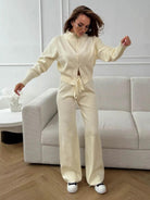 Langry fashion cream-colored zip-up tracksuit with white sneakers