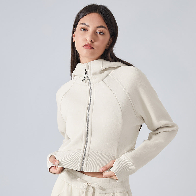 Woman’s beige hooded zip-up jacket for casual yoga wear in stylish Autumn Winter fashion