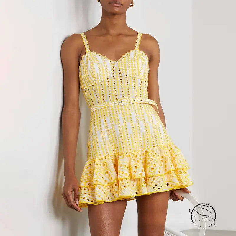 Yellow summer machine embroidery sundress with eyelet details, ruffle hem and waist slimming