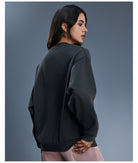 Black long sleeve casual fleece crew neck pullover sweatshirt with ribbed cuffs