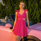 Pink mini dress with cutouts from Enchanting Backless Short Dress collection in fashion