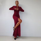 Burgundy langry fashion maxi dress with high slit and black heels