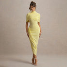 Elegant slim pleated yellow jersey dress with high neckline