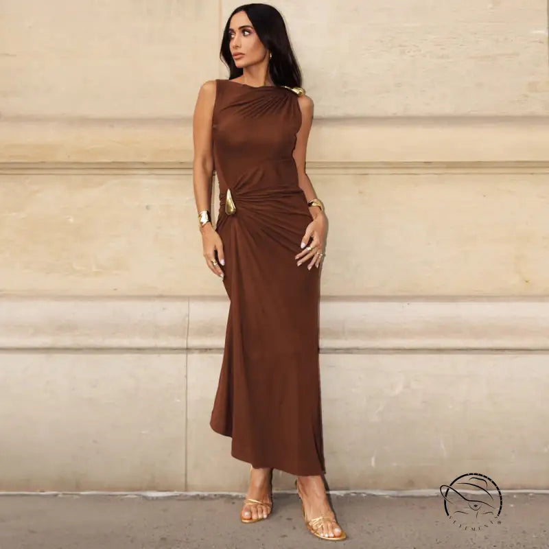 Elegant slim sheath sleeveless dress in brown satin with gold embellishments and high heels