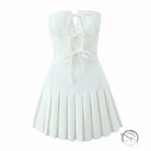 White langry strapless mini dress with pleated skirt and lace-up bodice