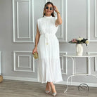 White pleated mid length dress with waist control and lace up details