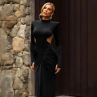 Beautiful high collar black velvet maxi dress with dramatic cutout