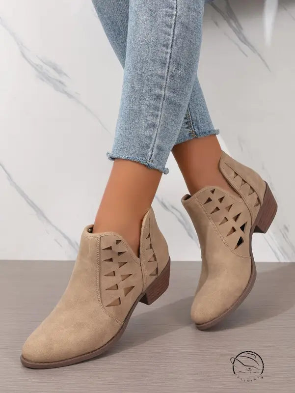 Beige suede daily ankle boots with side cutouts and low heels