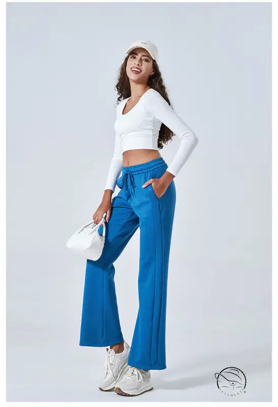 Bright blue flared summer air layer yoga pants with white cropped top