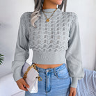 Cropped knit sweater featuring stylish lantern sleeves for trendy fashion looks