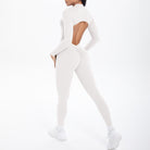 White long sleeve yoga top with back cutout and matching leggings