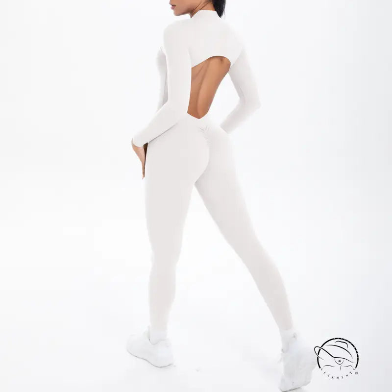 White long sleeve yoga top with back cutout and matching leggings