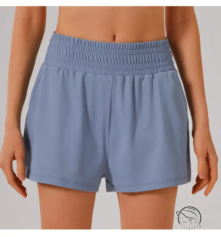 Light blue athletic shorts in loose sports yoga fitness set
