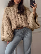 Beige cable knit oversized long sleeve sweater with bell sleeves