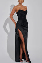 Elegant black strapless split dress with thigh-high slit for a chic fashion statement