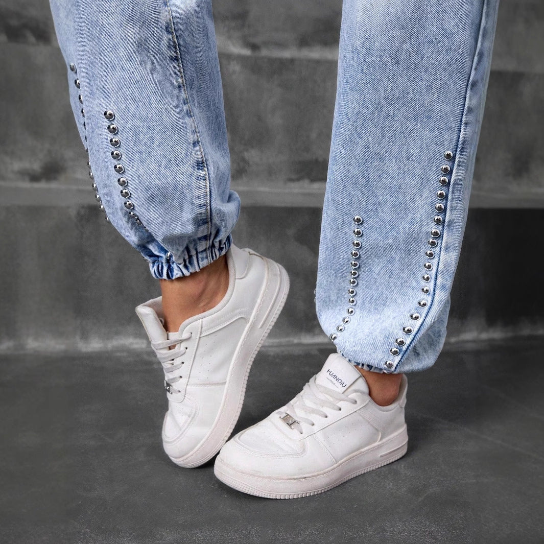 Light-wash denim jogger jeans with silver stud embellishments, perfect match beaded straight style
