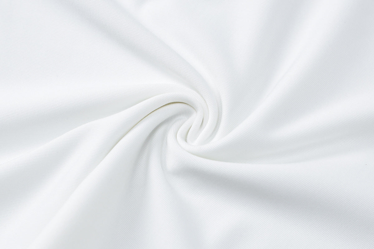 Swirling white fabric of the Elegant Backless Slim Fit Bodysuit in stylish langry fashion