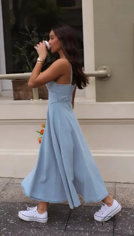 Light blue langry fashion dress with fitted bodice and midi skirt