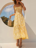 Yellow eyelet midi dress, a stylish and elegant addition to women’s fashion from Langry