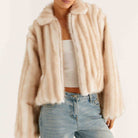 Beige faux fur cropped jacket with ribbed detailing and high collar