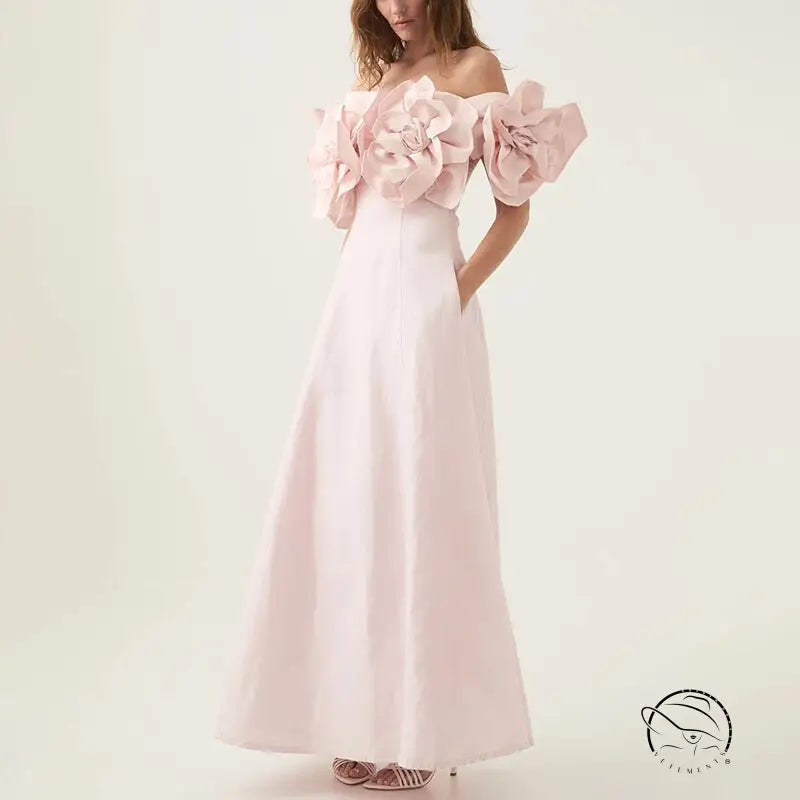 Graceful tube maxi dress in pink off-shoulder with floral accents