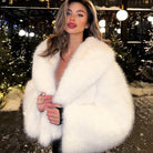 Cozy short faux fur coat with deep v-neck and wide lapels in Langry fashion