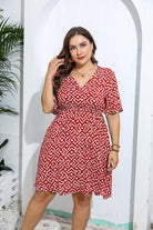 Red and white geometric print wrap dress, perfect for casual fashion looks and ملابس