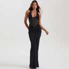 Elegant black halter neck maxi dress with ruched detailing and sheer chest panel from Langry fashion