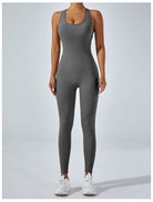 Sleek gray langry yoga one-piece jumpsuit with racerback design