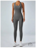 Sleek gray langry yoga one-piece jumpsuit with racerback fashion design