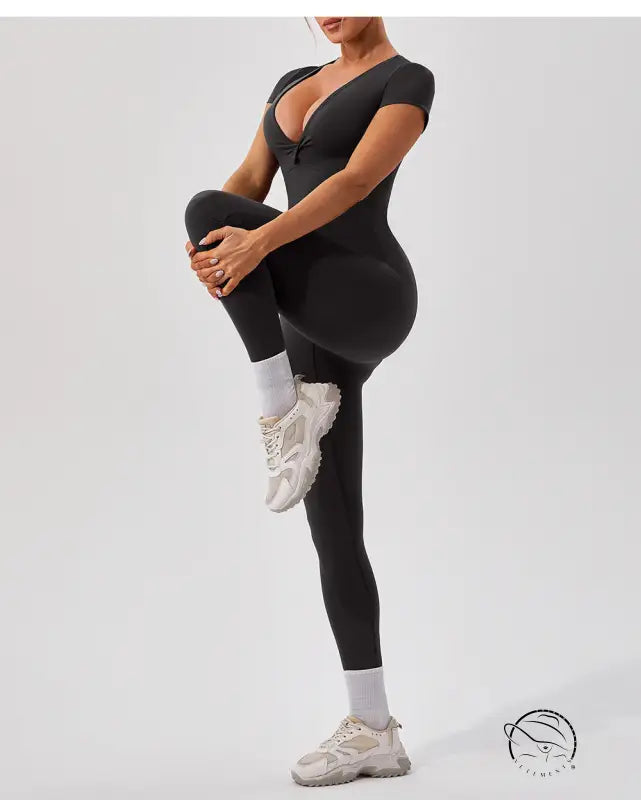 Langry black form-fitting yoga fitness bodysuit with deep v-neck