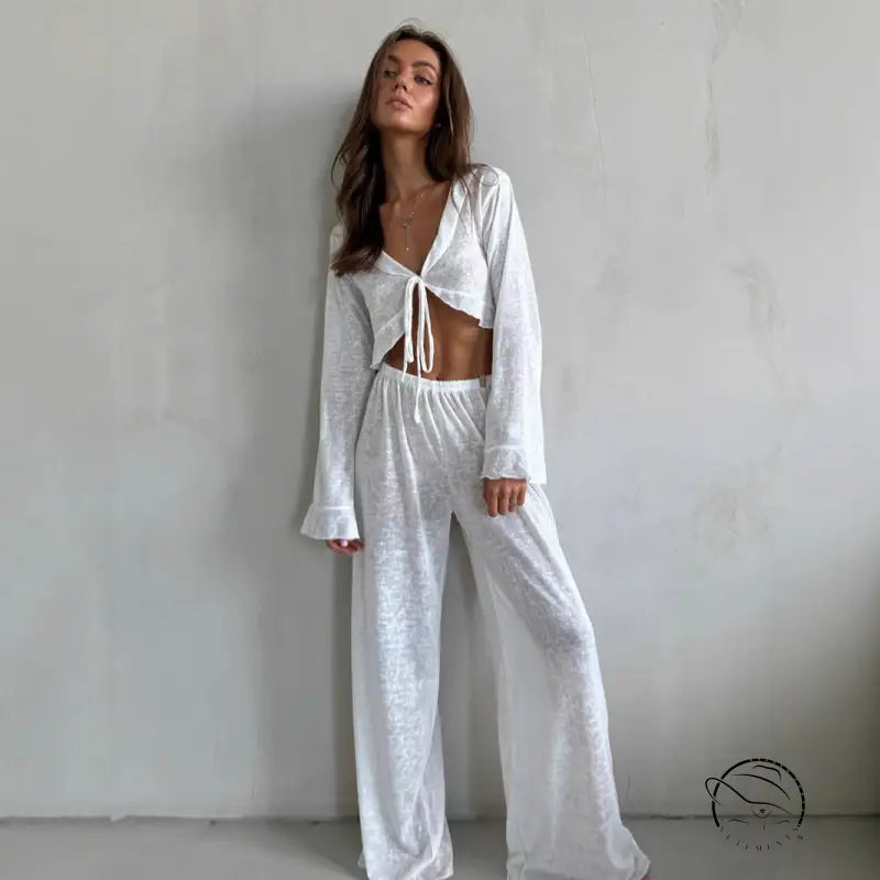 Woman modeling casual loose pajamas in white two-piece set