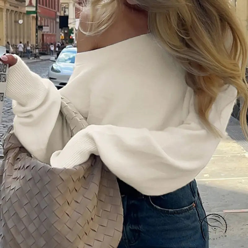 Cream off-shoulder langry fashion top with Bottega Veneta tote