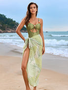 Olive green beach wrap dress with tropical leaf print, perfect for Langry fashion ملابس