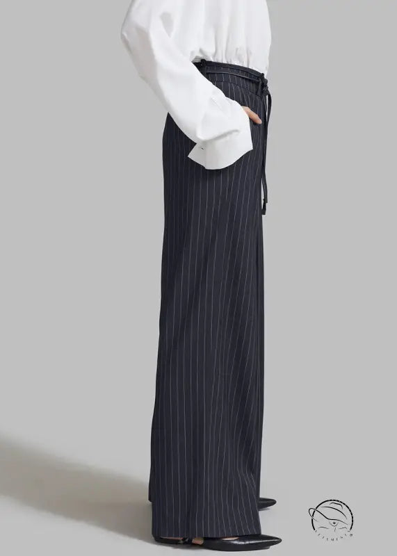 Women’s navy pinstripe loose drooping casual work pants with black tie belt