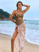 Brown swimsuit with pink floral beach sarong in Light & Elegant One Piece Swimsuit fashion